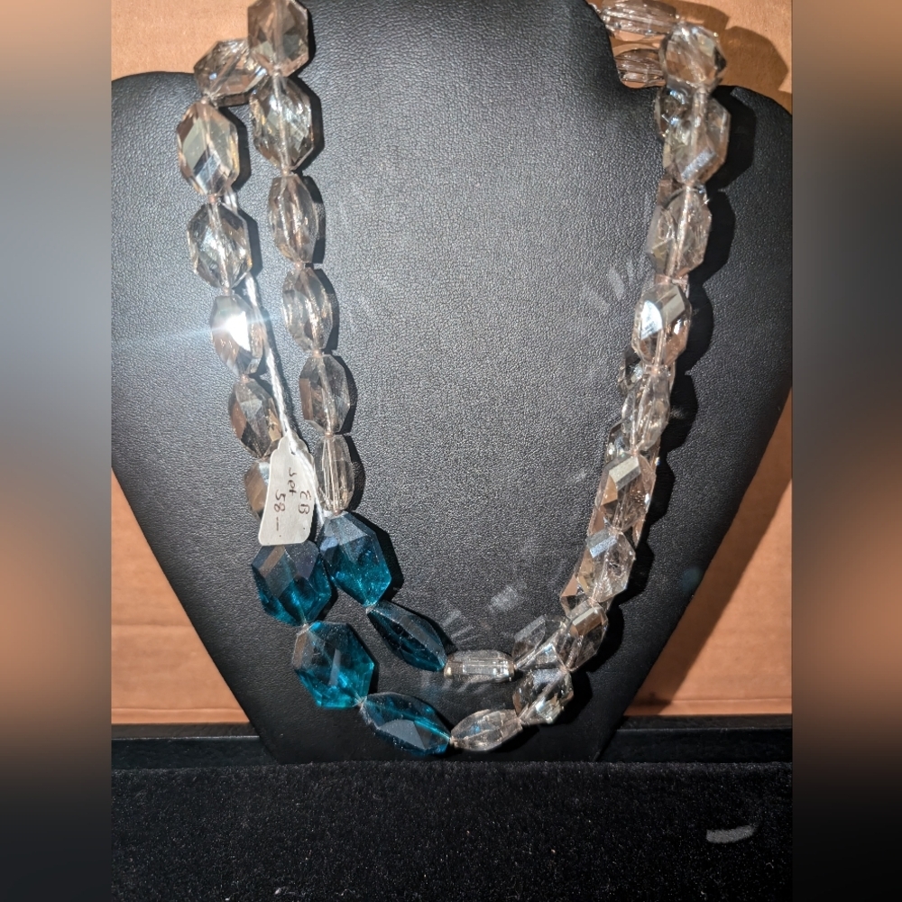 vintage glass crystal necklace featuring faceted clear and blue beads
